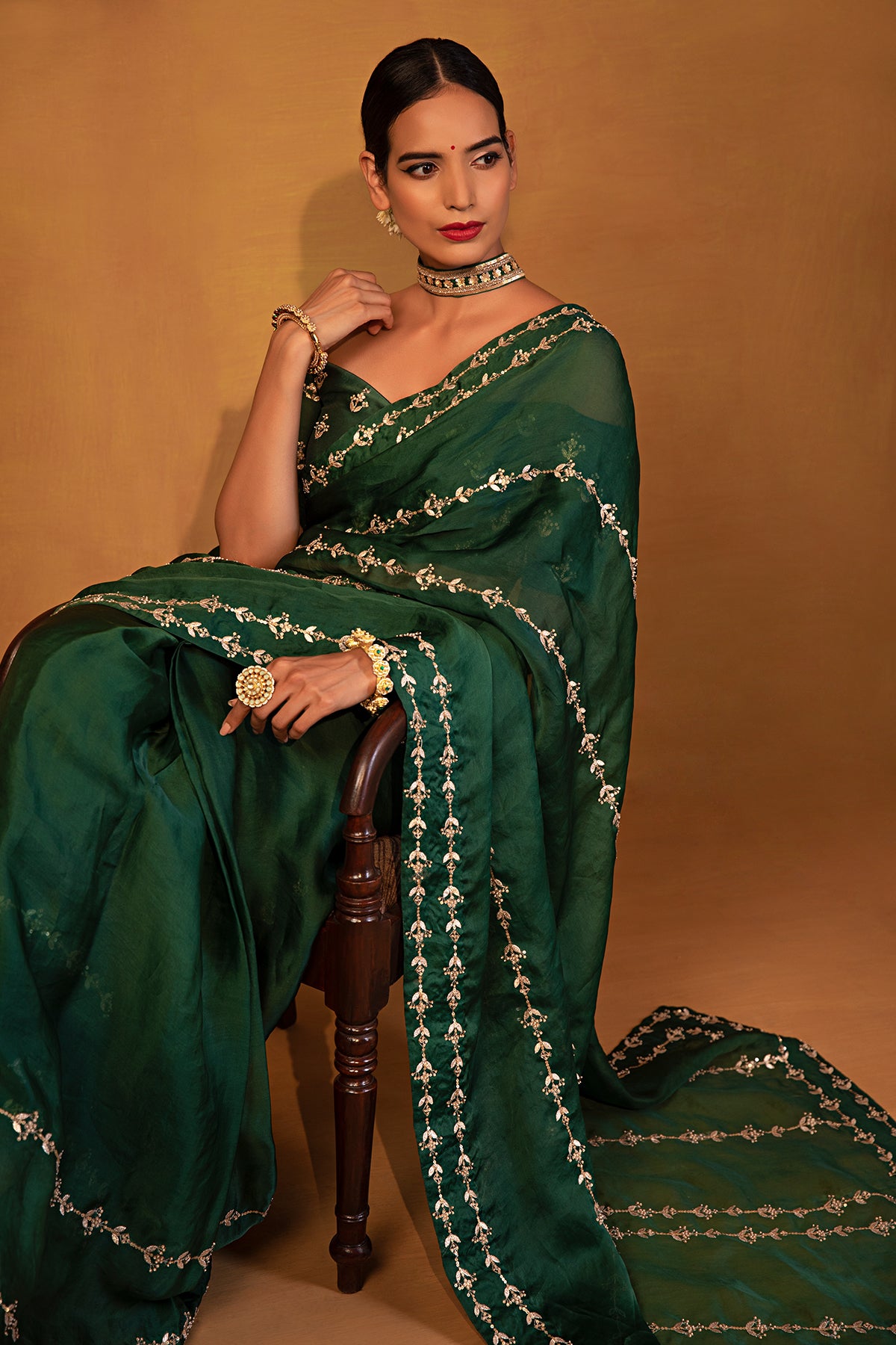 Dark green organza saree
