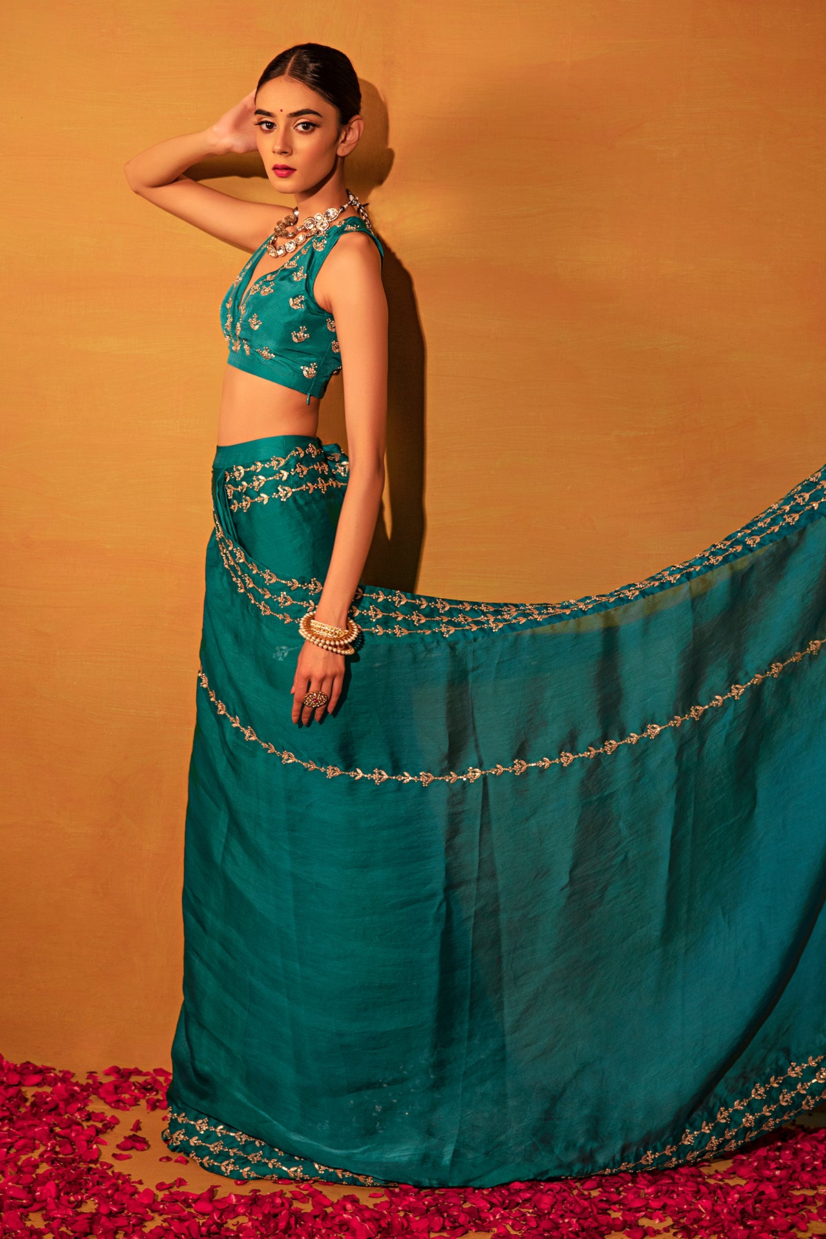 Teal green organza saree