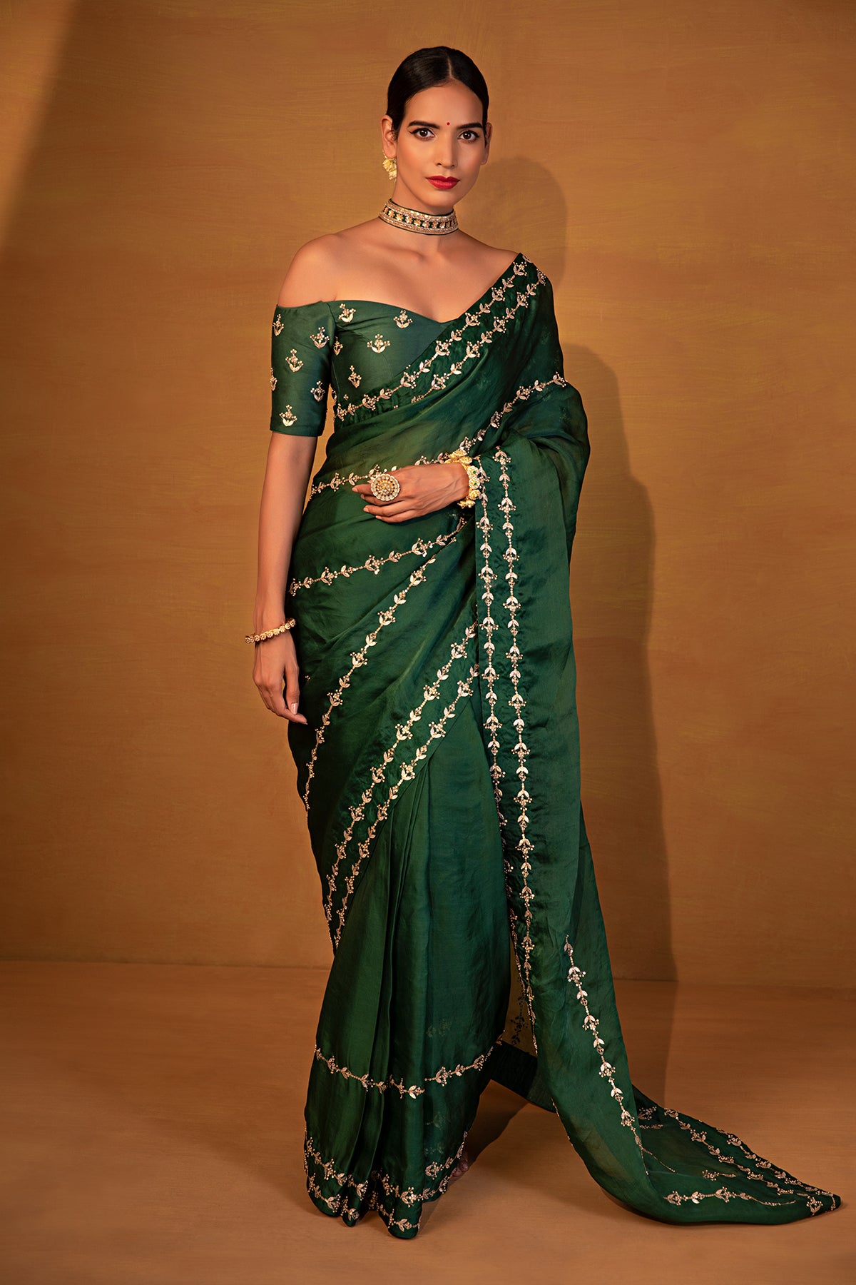 Dark green organza saree