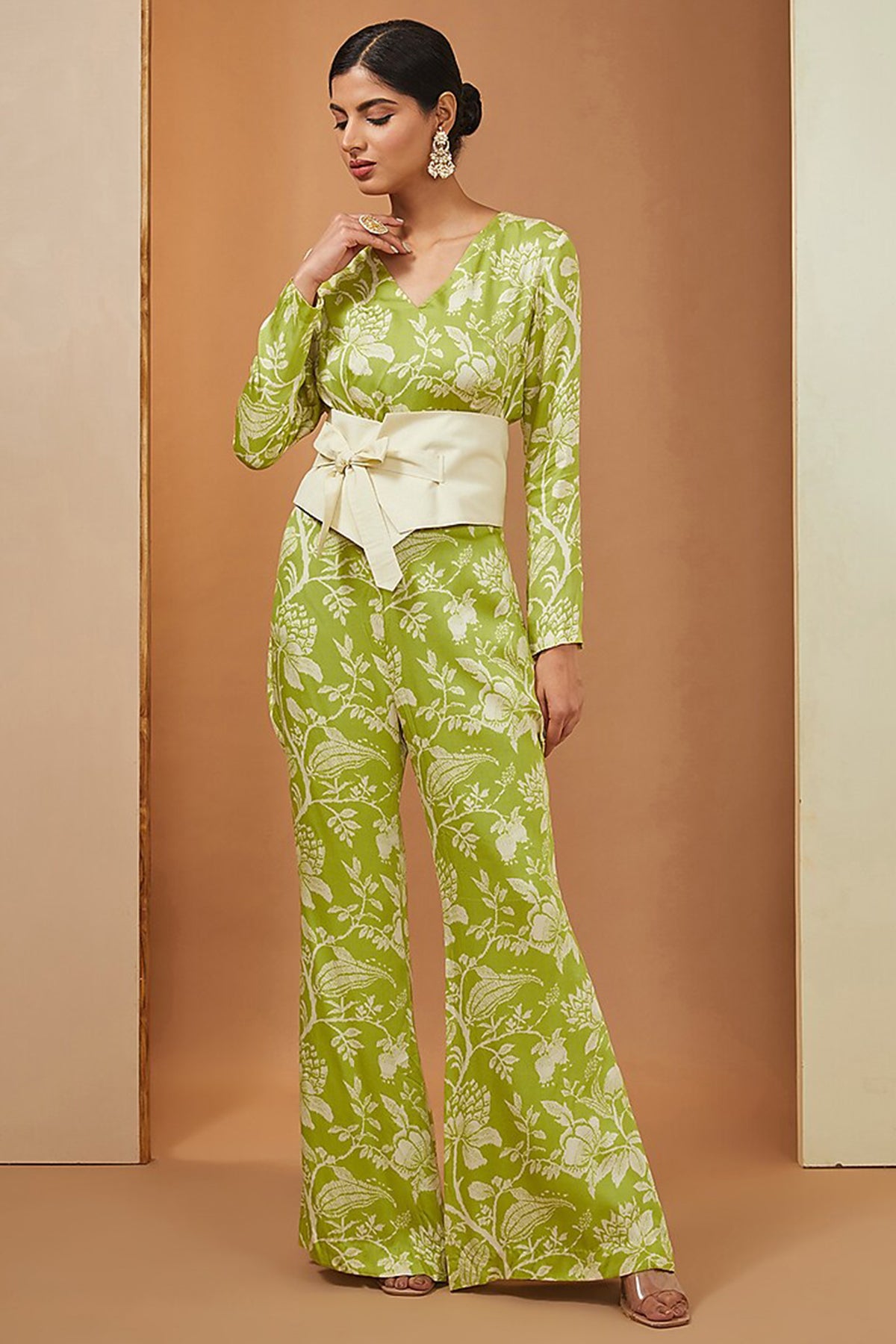 Mehendi green top & pant with off white belt.