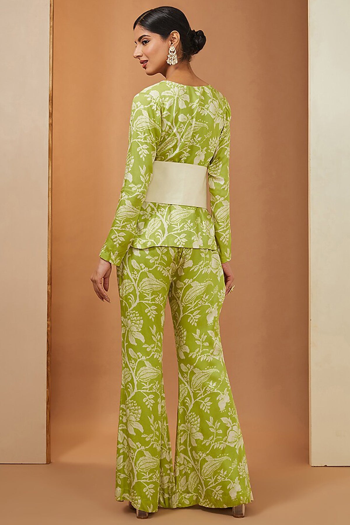 Mehendi green top & pant with off white belt.